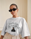 luxury-interior-t-shirt-mockup-female-model-with-sunglasses-in-minimalist-background-0547.webp