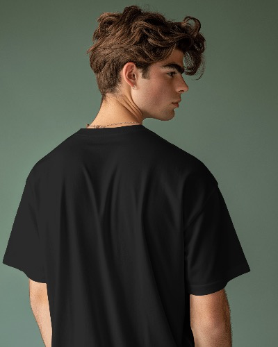 young-male-model-wearing-tshrit-mockup-against-green-background-scene1-0280-2.webp