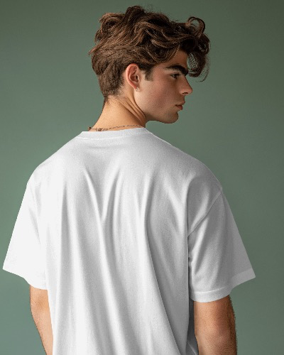 young-male-model-wearing-tshrit-mockup-against-green-background-scene1-0280.webp