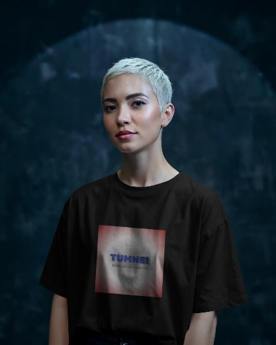 studio-lit-fashion-forward-t-shirt-mockup-female-model-with-platinum-hair-in-front-of-textured-dark-backdrop-confident-and-modern-aesthetic-01731.webp